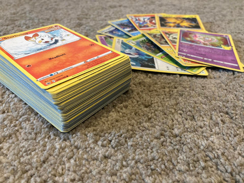 100 Pokemon Cards including 10 Holo Cards