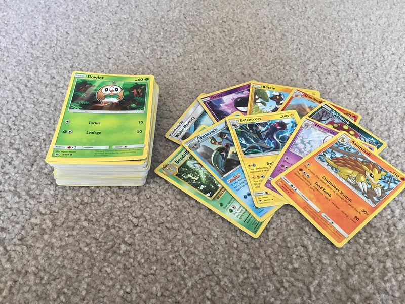 100 Pokemon Cards including 10 Rare / Reverse Bulk Pack