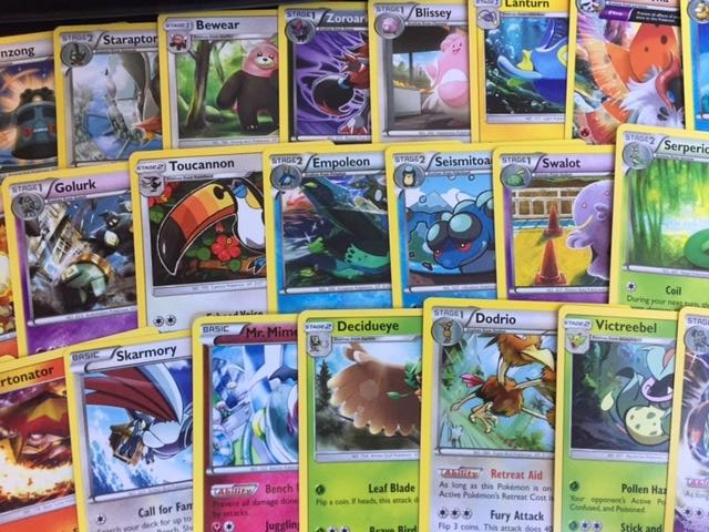 100 Rare / Reverse Pokemon Cards $20